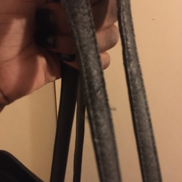 This Michael K bag is still in good use,wear on strips but no stains. - Picture 5 of 5